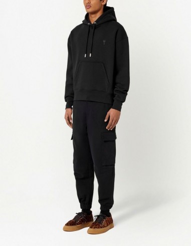 AMI PARIS oversize black hoodie with tone-on-tone logo.
