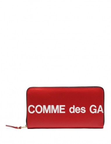 Grand portefeuille rouge avec logo COMME DES GARÇONS WALLET.